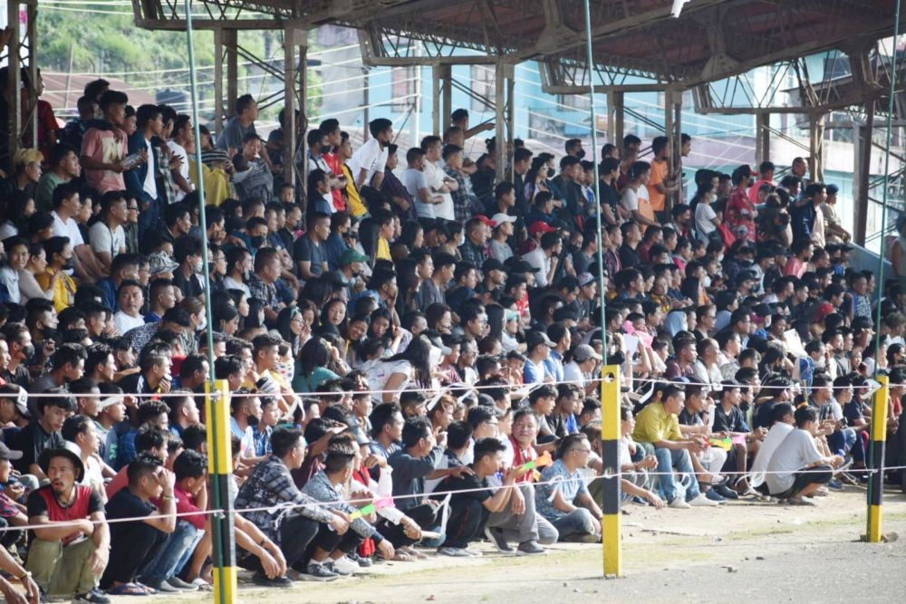 Football lovers turned out in huge numbers despite the poor infrastructure at the venue of the Dr T Ao trophy in Mokokchung. (Photo Courtesy: Sentilong Longkumer)